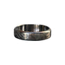Detailed side view of Forma Nova Damascus titanium ring