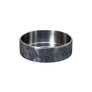 Detailed view of the 22mm titanium Damascus beauty ring and its layered curved engraving