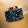 Detail and finish of this personalized haku venna heritage blue gold beluga relief in Titanium titanium cap