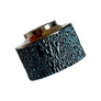 Gros plan sur la qualité de ce haku venna heritage blue ghost relief vh 7 en Titane Heritage