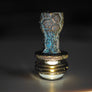 ORIGIN titanium Boro drip tip showing its irregular sculpted texture