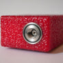 The Mini by ReseT Mods, red version, squonk mod equipped with Reset 510 connector and customized by Laser Custom Vap the specialist of engraving of vape gears. Available on Divavap.com