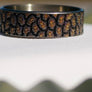 Titanium Beauty ring gravée en relief par Laser Custom World France. Hoodies Beauty ring relief engraving by Laser Custom World France.
