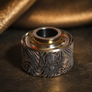 Close-up of Alien engraved titanium cap in premium titanium for Antiquity V1