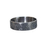 Wowsers Damascus titanium beauty ring with intricate engraved flowing lines