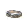 Relief engraved titanium ring with arranged detailed skulls