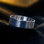 Close-up of the engraved faces on Wowsers Medusa beauty ring W085