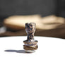 Close-up of the Moon Micro Gold engraved titanium Boro drip tip