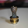 Angled view of the ORIGIN engraved drip tip for Boro tanks